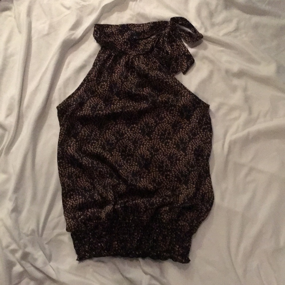 Dressy sleeveless blouse with tie neck